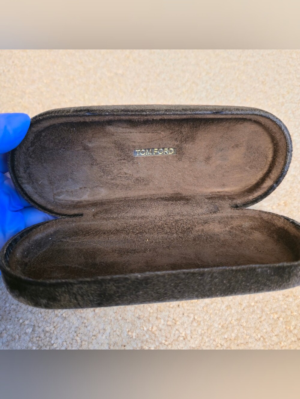 Hard-shell velvet Tom Ford sunglasses case in brown or black with a gold logo